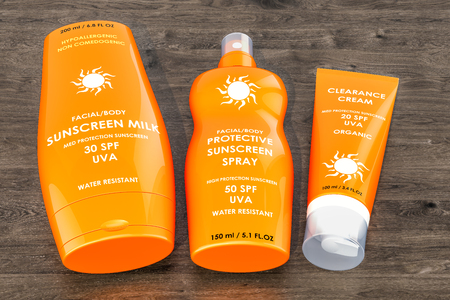 Sunscreen products on the wooden table. 3D renderingの写真素材