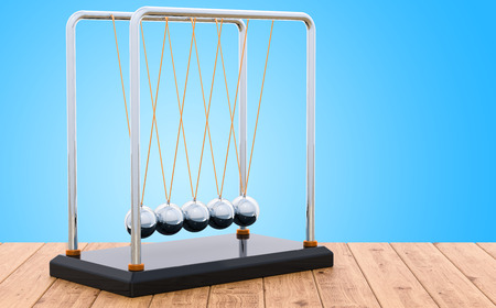 Pendulum, Newton's cradle on the wooden table, 3D renderingの写真素材