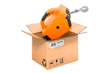 Portable Electric Winch inside cardboard box, delivery concept. 3D rendering isolated on white backgroundの写真素材
