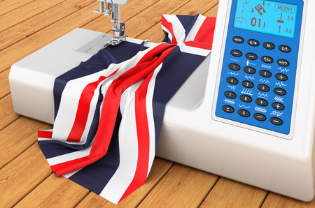 Modern sewing machine with British flag on the wooden table. 3D renderingの写真素材