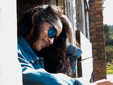 Young girl with sunglassesの写真素材