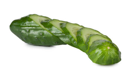 Green cucumber cut into slices isolated on white backgroundの写真素材