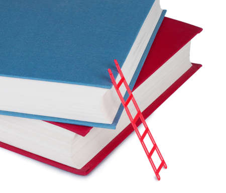Two books with a ladder isolated on white backgroundの写真素材