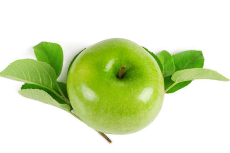 Bright green apple with leaves isolated on whiteの写真素材