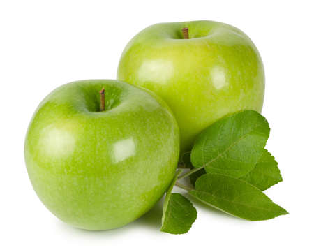Bright ripe apples with leaves isolated on white backgroundの写真素材