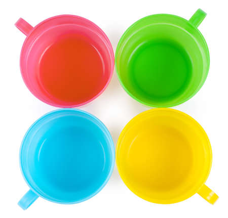Four plastic cups with handles isolated on white backgroundの写真素材