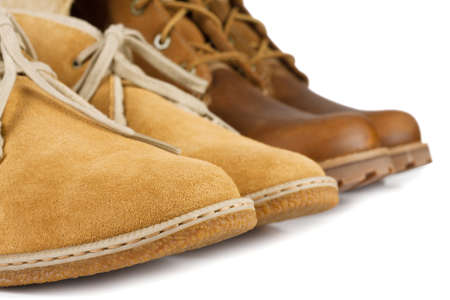 Yellow and brown shoes isolated on white backgroundの写真素材