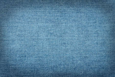 Blue jeans background with smooth dark contourの写真素材