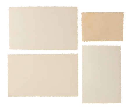 Old yellowed photographs isolated on white backgroundの写真素材