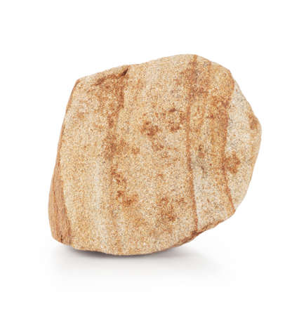 Piece of yellow sandstone isolated on white backgroundの写真素材