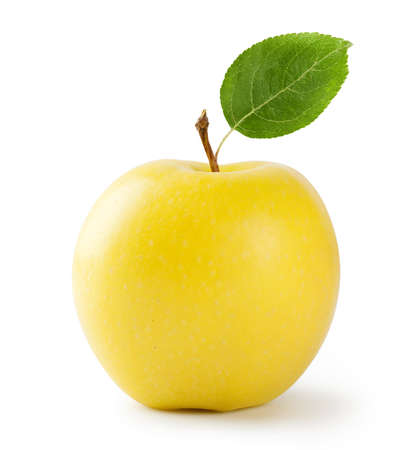Ripe yellow apple with leaf isolated on white backgroundの写真素材