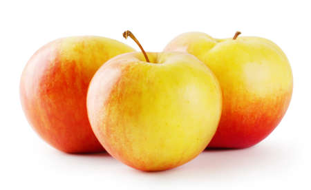 Three ripe juicy apple isolated on white backgroundの写真素材