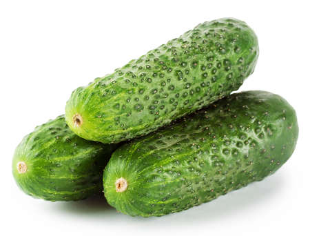 Three green cucumber isolated on white backgroundの写真素材