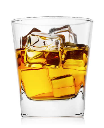 Glass of whiskey with ice isolated on white backgroundの写真素材