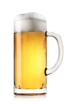Mug of fresh light beer with foam isolated on a white backgroundの写真素材