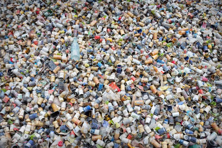 Background bottle caps stacked in a pileの写真素材