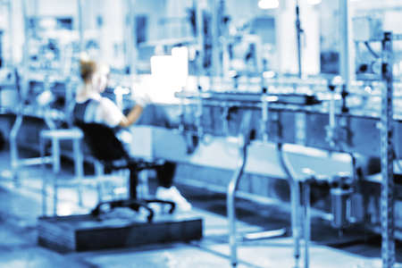 Silhouette woman in workplace photographed with blurred focusの写真素材