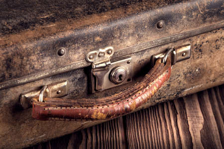 Detail shot of an old suitcase with selective focus