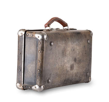 Old worn brown suitcase isolated on white backgroundの写真素材
