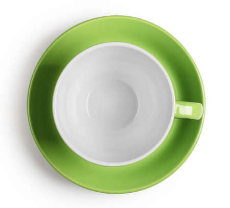 Shot from above green cup with saucer isolated on white backgroundの写真素材