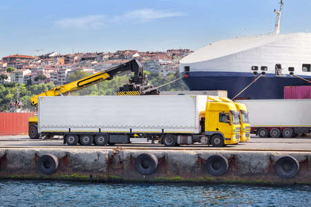 Truck unloading in a port on the Seaの写真素材