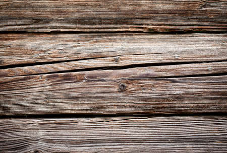 Background of cracked rough planks with knotsの写真素材