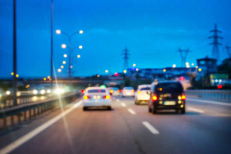 Illuminated road car shot with blurred focus