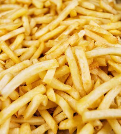Pile of potato fries shot with selective focusの写真素材