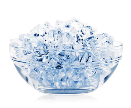 Transparent plate with ice cubes isolated on white backgroundの写真素材