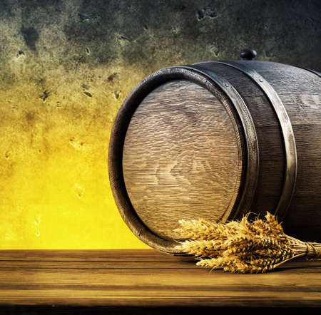 Oak barrel with spikelets toned yellow and blueの写真素材