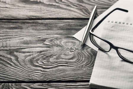 Business concept with glasses and penの写真素材