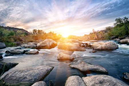 Roll on mountain river among the stonesの写真素材