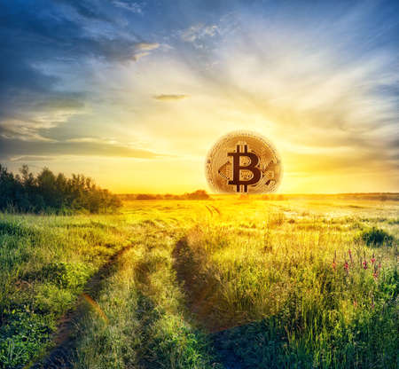 Bitcoin in the form of the rising sunの写真素材