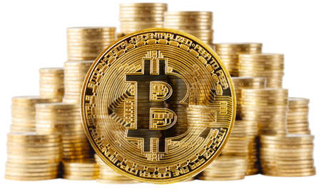 Gold bitcoin on a background of rising columns of coinsの写真素材