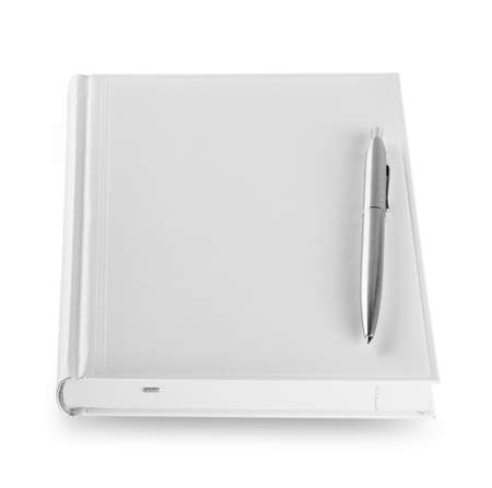 White closed diary with penの写真素材