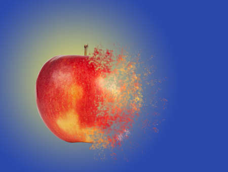 Red apple is scattered into piecesの写真素材