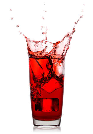 Splash of fresh natural cherry juice in glassの写真素材