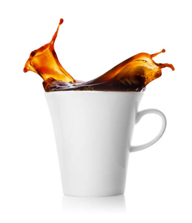 Splash of coffee in a cupの写真素材