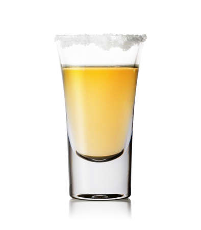 Glass of tequila with salt on the rimの写真素材