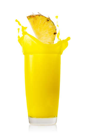 Pineapple slice splash in pineapple juiceの写真素材