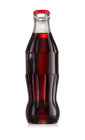 Glass bottle with red cap and carbonated beverage insideの写真素材
