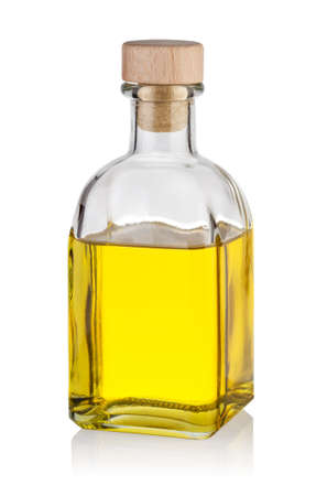 Bottle of yellow oil with capの写真素材