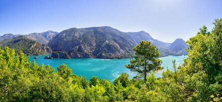 Panorama of Green Canyon surrounded by treesの写真素材