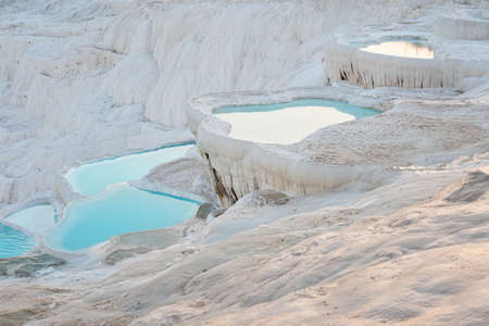 Natural travertine pools and terraces with water in Pamukkaleの写真素材