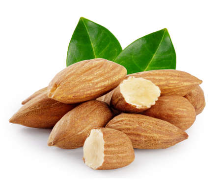 Nuts almond with green leavesの写真素材