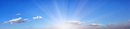 Panorama of blue sky with bright sunの写真素材