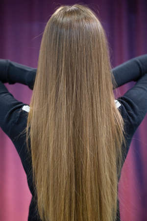 Girl with long blond hairの写真素材