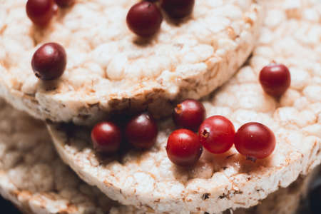 Isolated on a white background, fresh cranberries. Healthy and vitaminized food for a person.