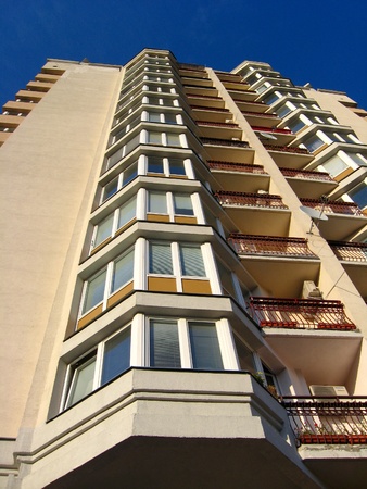 The multi-storey modern house on the blue sky backgroundの写真素材