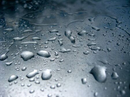 The image of droplets of water on glassの写真素材